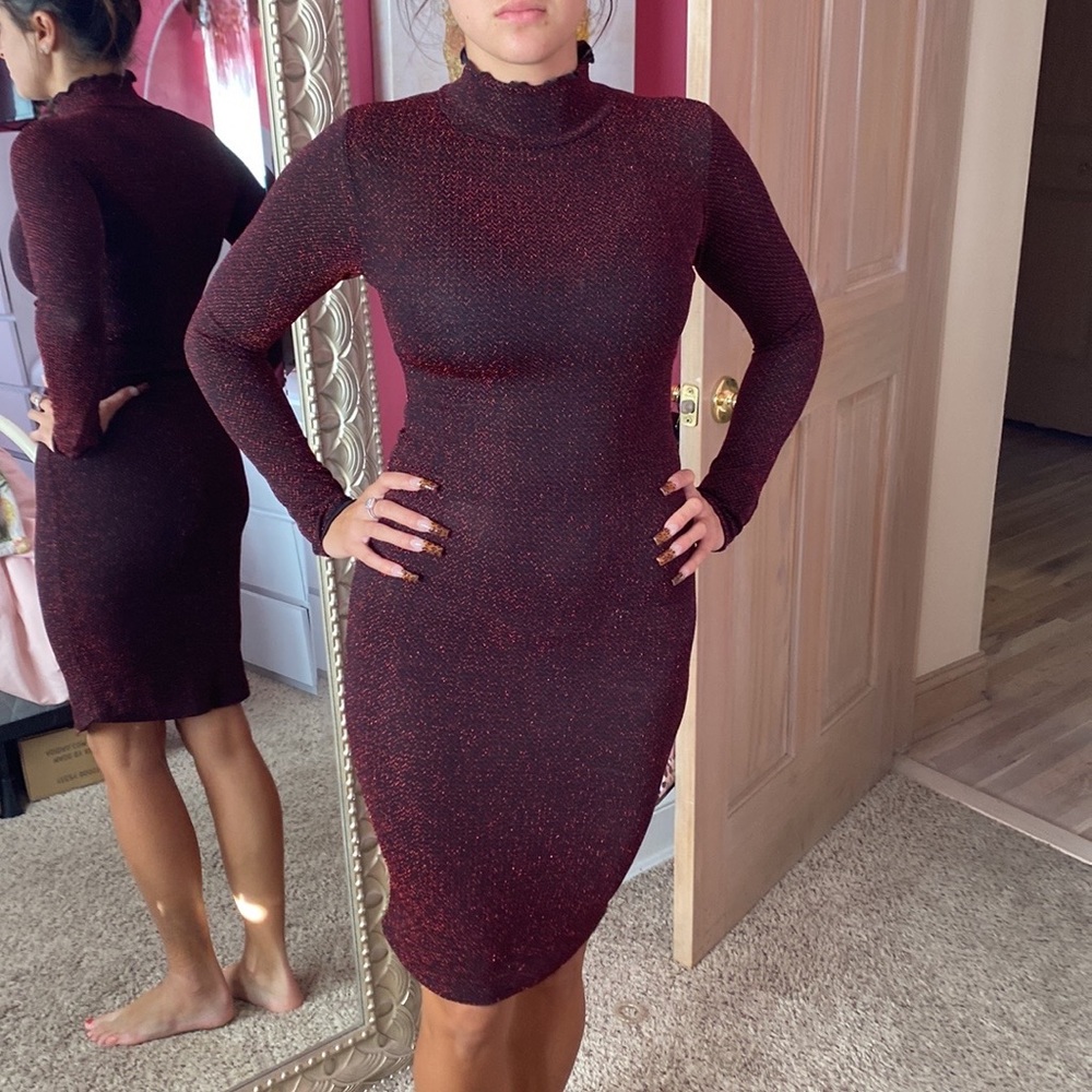 Sexy form fitting red/black metallic dress.